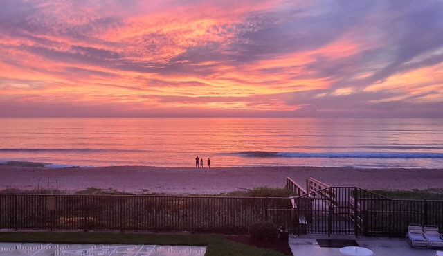 Actually on the beach! Step off balcony onto the beach & pool! Rare Find!