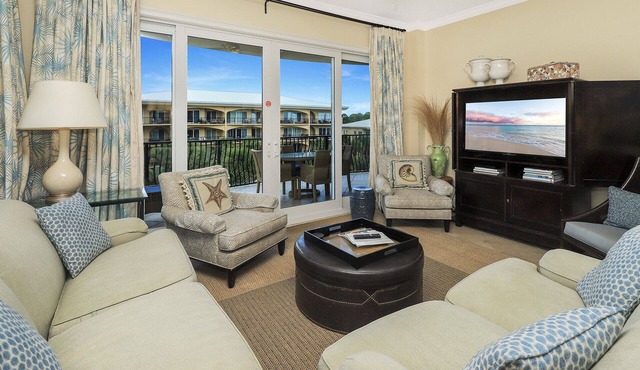 Adagio D-301 Poolside, Corner unit - front left bedroom has window ocean view