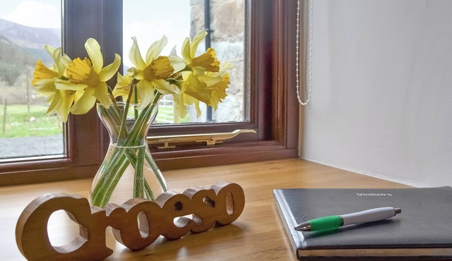 Adjoining the original farmhouse this lovely cottage is almost at the foot of Mount Snowdon.