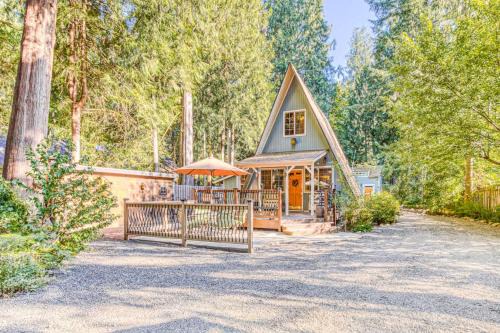Adorable A-frame cabin withnearby river access game room wood stove firepit