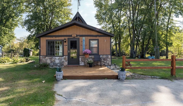 adorable A-frame house nestled right by the river