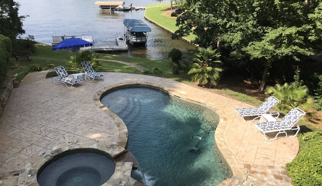 Adorable lakeside oasis on Lake Oconee with private pool and full size dock.