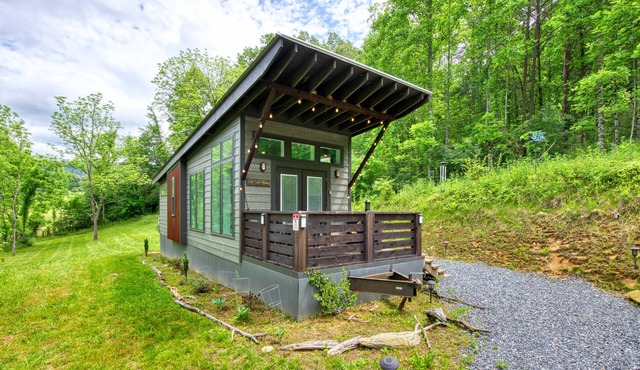 Adorable tiny bungalow with furnished, covered porch, large Smart TV, & W/D