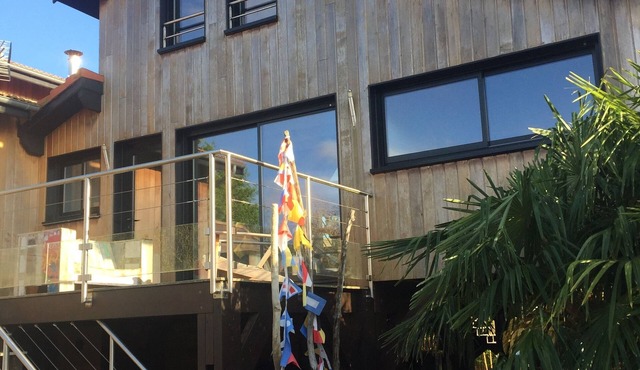 Adorable wooden house with swimming pool on the coastal path