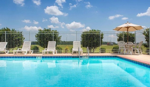 Affordable Getaway! in Knights Inn Bunkie! Pool, Free Parking, Free Breakfast