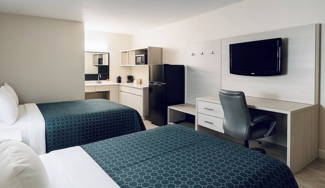 Affordable hotel suites with WiFi, AC in charming McDonough