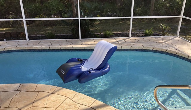 Affordable, Spacious Heated Pool Home in Quiet setting, yet Close to Everything