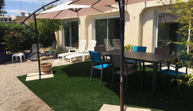 Air-conditioned apartment - All comforts - with garden and parking space