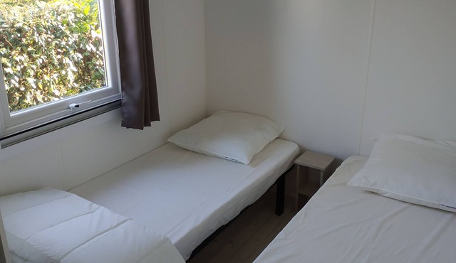 Air-conditioned mobile home with TV