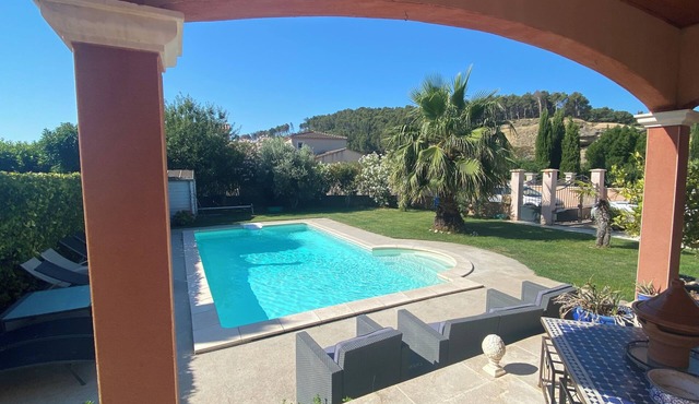 Air-conditioned room in spacious villa with swimming pool