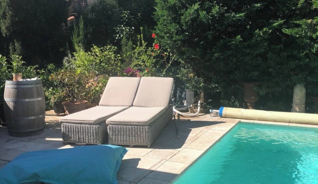 Air-conditioned town house with heated swimming pool