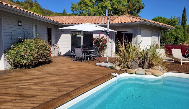 Air-conditioned villa with pool terrace, parking, solar roof and charging station.