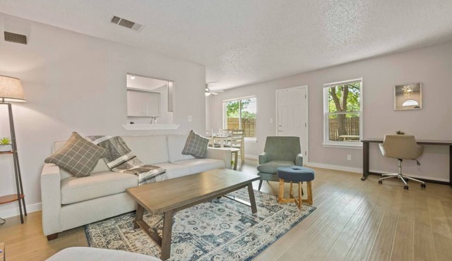 Airy and cheerful, newly renovated home is your sanctuary in bustling North Austin! 1,100+ SF of living area with roomy walk-in closets and large private backyard let you unpack and unwind.