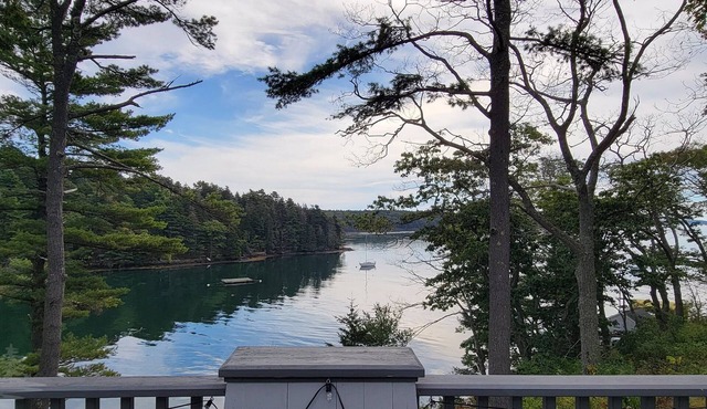 All Decked Out: 5BR/4BA Coastal Retreat with Panoramic Water Views and Shared Dock Access