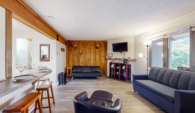 All-seasons condo with on-site golf, pools, athletic courts, gym, & EV charger