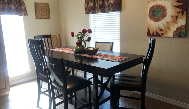All the Comforts of Home Duplex. Backyard grill and atmosphere. Extra services!