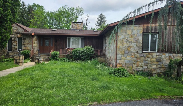 Amazing 6 bedroom home featuring a wraparound deck & private pool