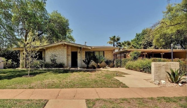 Amazing and centrally located summer oasis with a Mid-century modern feel