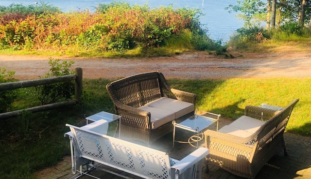 Amazing Bay Views from Every Room At This Breezy Beach Cottage!