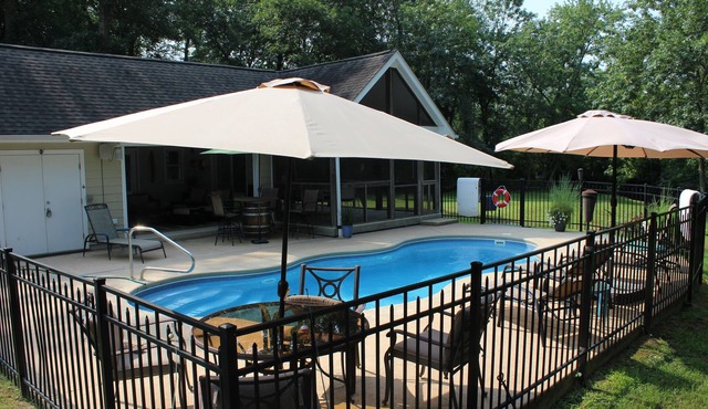 AMAZING Coastal Retreat along Love Creek w/private pool, hot tub and pool house