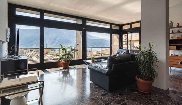 amazing design apartment with balcony overlooking the lake with private garage