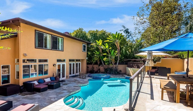 Amazing house with pool, hot tub, landscaped patio, grill, AC, & kid's playhouse
