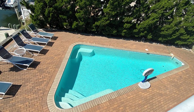 AMAZING LAGOON FRONT HOUSE WITH HEATED POOL AND HOT TUB IN HARVEY CEDARS, LBI