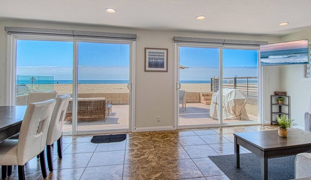 Amazing location with an amazing, newly-remodeled lower unit right on the sand!