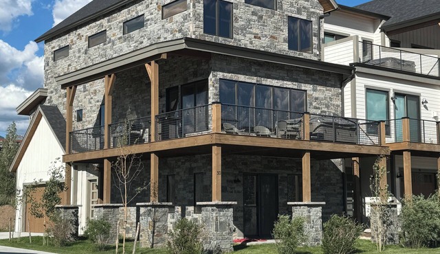 Amazing new corner 5-bedroom townhome in Fraser perfect for family getaways.