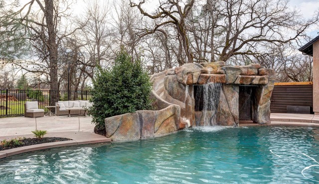 Amazing pool w/water slide, basketball court, country living, house is dialed!