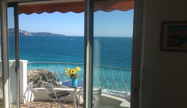 AMAZING VIEW! 30 Seconds to Beach! A/C,WIFI,Phone,TV, Balcony