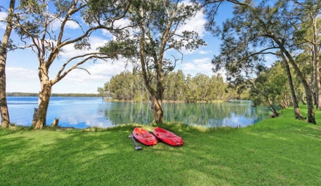 Amazing views from this lakeside house surrounded by nature and near the ocean