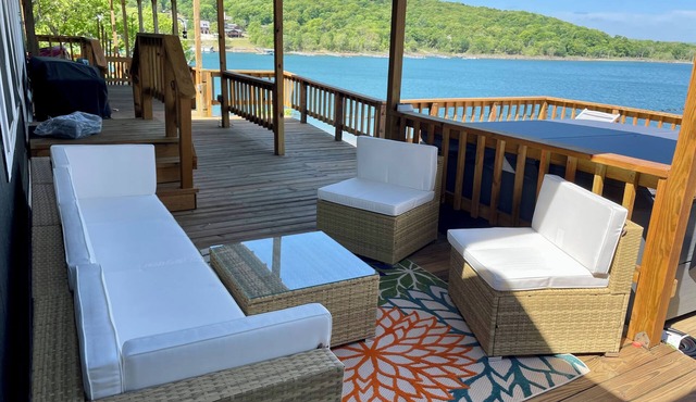 AMAZING WATERFRONT HOME WITH HOT TUB. BOTH HAVE EXTENSIVE VIEWS OF THE LAKE