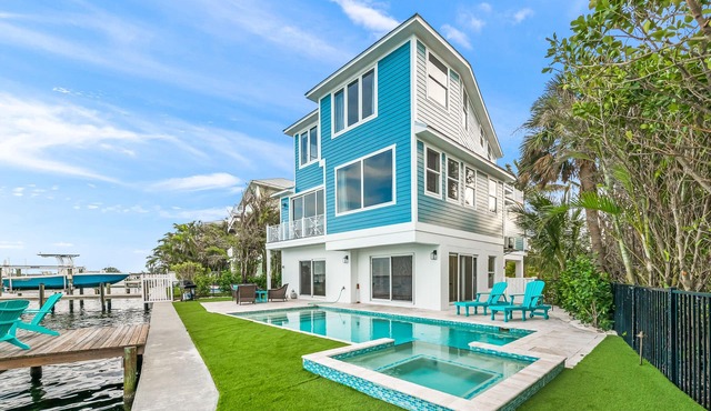 Amazing waterfront home with pool and spa, close to beach!