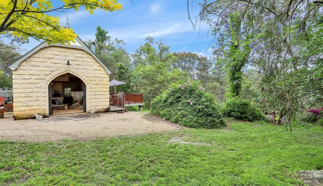 Ambient stone guest house set amongst a historical farmhouse backdrop.