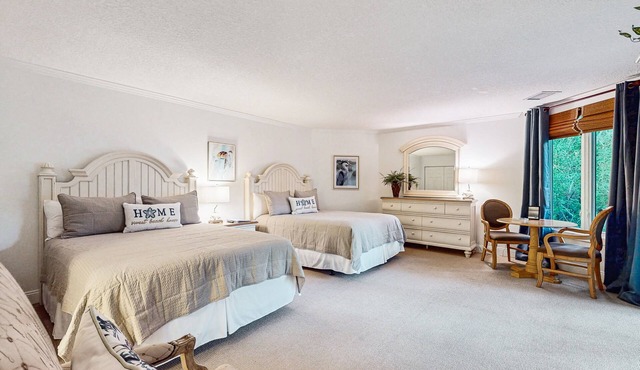 Ameila Island Plantation condo with beach access, private patio and pool.