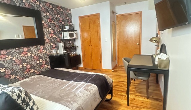 Amelia Suites Newark – Cozy stay with AC, Wi-Fi & NYC access!