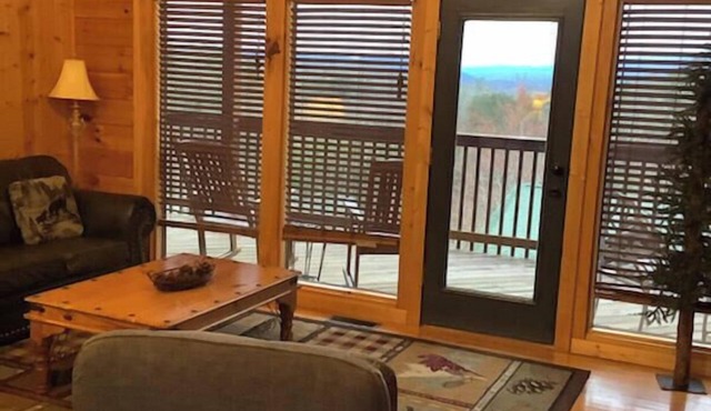 American Spirit is a charming two-bedroom cabin located in Hidden Springs Resort