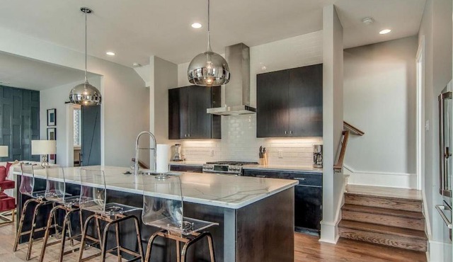 Amplify at the Gulch modern 3 story condo 2 car garage rooftop fire pit security and view