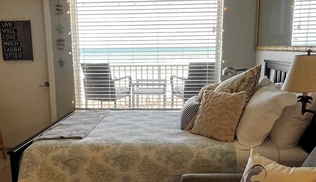 An adorable, direct oceanfront front studio with a large private balcony.