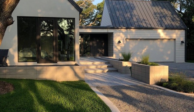 An architectural gem surrounded by beachy Oak trees! MUST SEE! New construction!