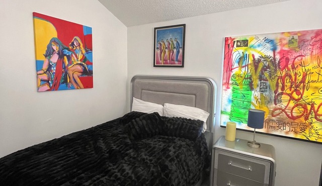 An artist’s room in a gallery.