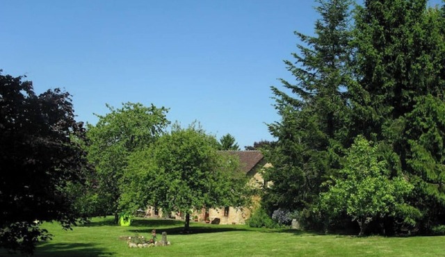 An authentic Percheron house: fireplace, beams, terracotta floor tiles, a large park