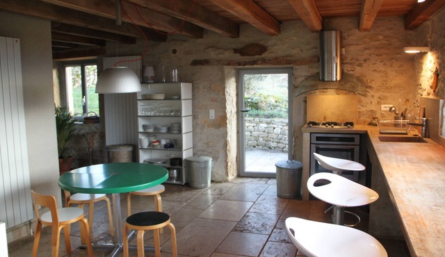 An authentic white stone barn renovated for 4, with fireplace