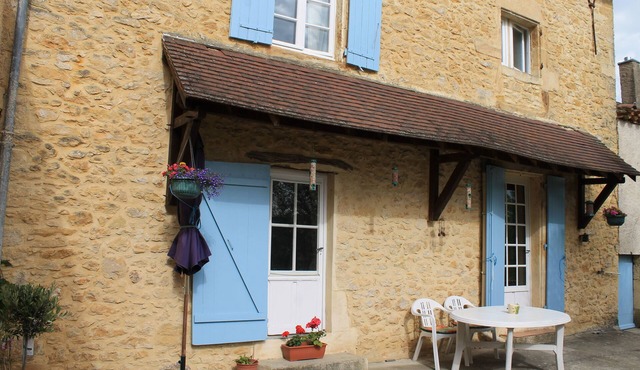 An exclusive Village Holiday Cottage in the Dordogne. Log fire & private terrace