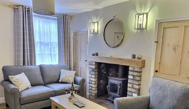 An iconic flint terraced cottage centrally located in the heart of Holt