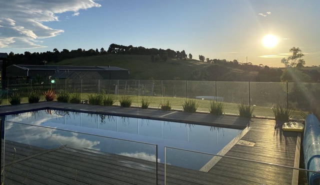 An idyllic 6 bedroom, north facing property set on 5 acres, rolling hill views.