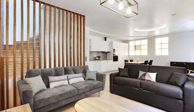 An Inviting 2-BR/1BA Townhouse in Marx Dormoy