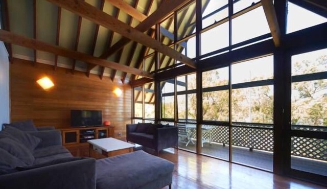 An island style escape - Stunning oak A-frame Waterfront home Access by water