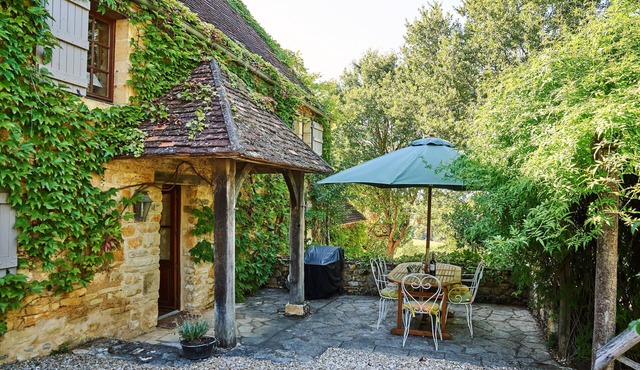 An old stone cottage full of rustic charm with pool and stunning views